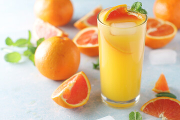 Red oranges juice with mint and ice