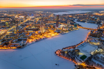 Yekaterinburg aerial panoramic view in Winter at sunset. Ekaterinburg is the fourth largest city in Russia located in the Eurasian continent on the border of Europe and Asia.