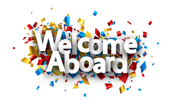 Welcome aboard sign over colorful cut out foil ribbon confetti background.