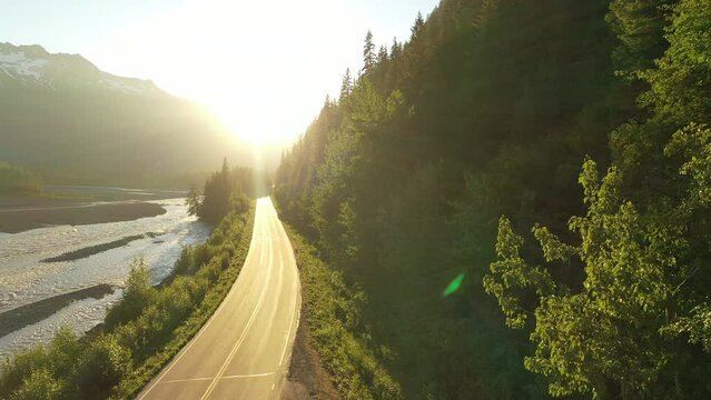 Aerial landscape. Alaska highway, road trip, adventure inspiration. Summer sunset