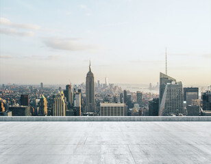 Empty concrete dirty rooftop on the background of a beautiful NY city skyline at daytime, mock up