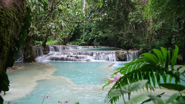 Beautiful Clear Waterfall Cascade In Tropical Rainforest, Kuang Si Falls In Luang Prabang, Laos
