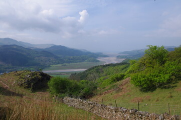 Fototapeta na wymiar Beautiful Welsh mountain scenery. View along the River Mawddach Estuary to the sea from New Precipice Walk, which enables disabled access to panoramic mountain views. Dolgellau, Gwynedd, Wales.