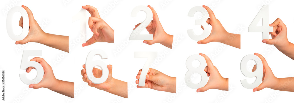 Poster children's hands hold numbers. a set of white numbers in hands on a black isolated background. zero,