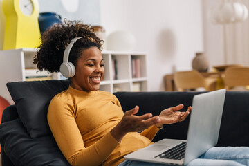 Happy businesswoman talks on a meeting online