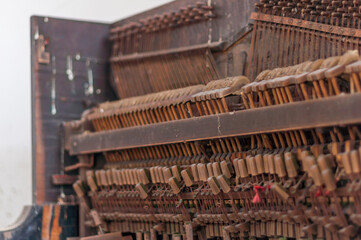 Destroyed piano in an abandoned old historic mansion palace in Poland in Central Europe