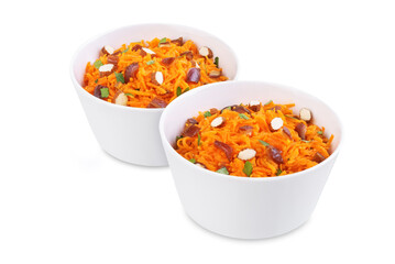Carrot nuts dated moroccan salad in a bowl on a white isolated background