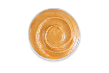 Peanut butter in a bowl on a white isolated background