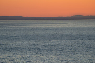 Obraz premium Sunset over northern Hokkaido from the Shiretoko Peninsula. Japan.