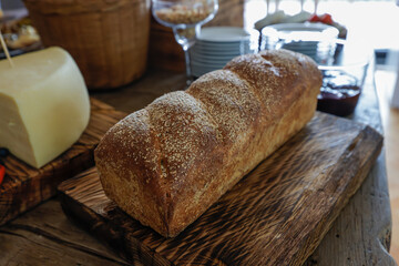 wheat bread on wooden board