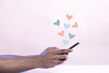 young black man sending a love text message concept