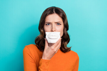 Photo of minded lady thinking correction own natural lips isolated on cyan color background