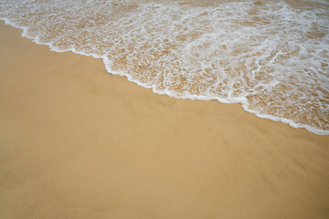 Waves with foam on the Atlantic coast in Cape Verde.