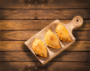 Traditional Argentine salty empanadas stuffed with meat
