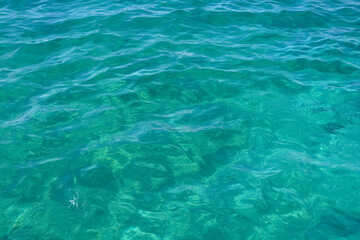 Azure Caribbean sea calm and clear water. Blue aqua marine background.   