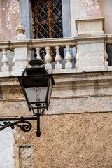 Detail of a 19th-century street lamp in the streets adjacent to the cathedral of Monreale.