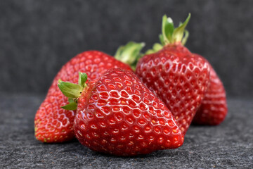 Strawberries on grey table