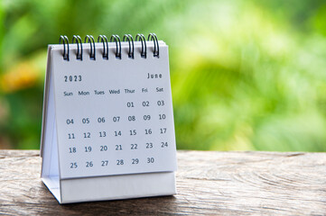 June 2023 table calendar with customizable space for text or ideas. Monthly calendar concept and...
