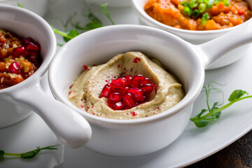 mutabal Turkish cuisine with pomegrenade segments macro close up