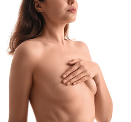 Naked young woman on white background. Breast cancer awareness concept
