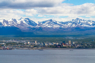 Downtown Anchorage, Alaska with Chugach mountains in the background.