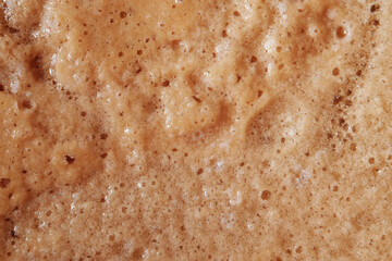 Mixture of coconut powder on cola drink