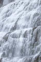 Fototapeta na wymiar Dynjandi Waterfall Water Texture, Beautiful Pure Nature in Iceland, Powerful Mountain River Background