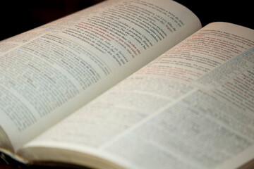 Fototapeta premium holy bible used for studies, open in half on a pulpit