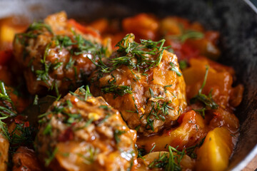 Meatballs with vegetables and tomato sauce