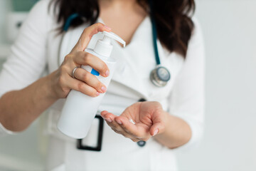 the dermatologist touches the hands smears with cream, dry skin, skin disease. close up