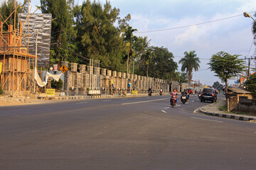 Motorcycle on street corner midday