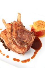 grilled or roast delicious juicy lamb chops or lamb rack food on white plate background with bbq barbeque sauce, this photograph taken for make restaurant menu book
