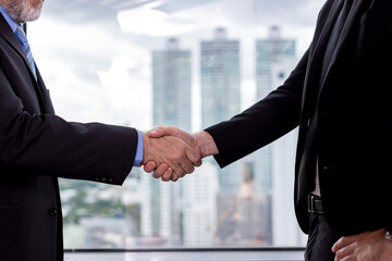 Business people shaking hands. Businessman shaking hands during a meeting in the office