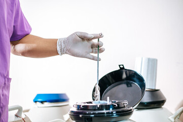Close up hand of researcher testing in a laboratory. Modern technologies in agriculture management, agribusiness and research concept.