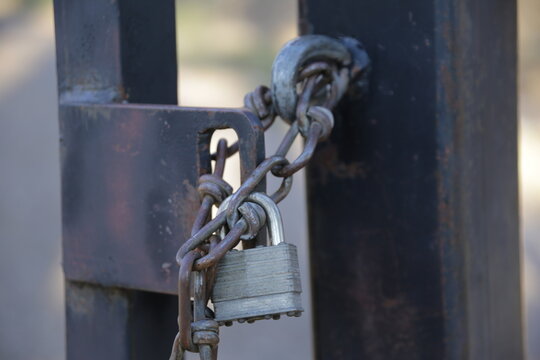A locked gate close up