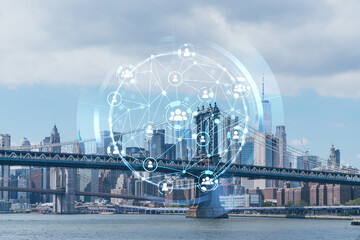 Brooklyn and Manhattan bridges with New York City financial downtown skyline panorama at day time over East River. Social media hologram. Concept of networking and establishing new people connections