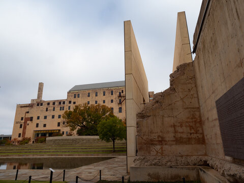 Low Angle View Of The Remaining Piece Of Wall Of The Murrah Federal Building Called The Survivor Wall At The Oklahoma City National Memorial And Museum