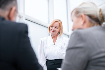 close up. a group of employees works in a modern office