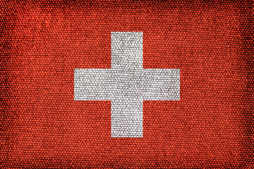Flag of Switzerland with the texture of rough fabric.