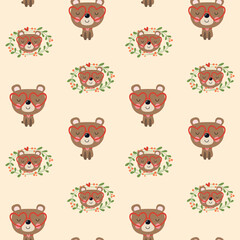 Fototapeta premium Seamless pattern of a teddy bear with heart-shaped glasses, full length and his face in a border of leaves