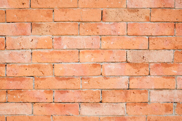 brick orange wall. background of a old brick house.