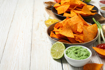 Concept of tasty snacks, corn chips, space for text