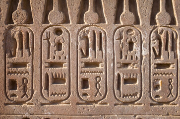 Egyptian hieroglyphs on ancient wall from Karnak Temple, Historical background