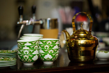 Oriental teapot and bowls for the tea ceremony.