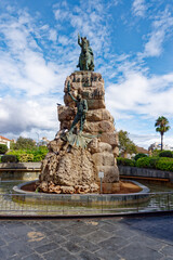 Cityscape of Palma de Mallorca with bronze statue statue of King Jaime I Jaume Primero of Aragon at Placa Espanya on a blue cloudy autumn day. Photo taken October 12th, 2022, Palma de Mallorca, Spain.
