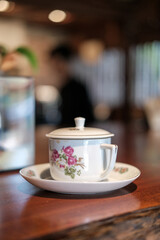 cup of coffee on a table, cup of coffee, cup of tea, cup of tea and teapot