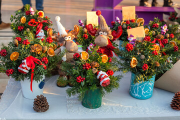 bouquet of flowers and fruits on fair winter decorations 