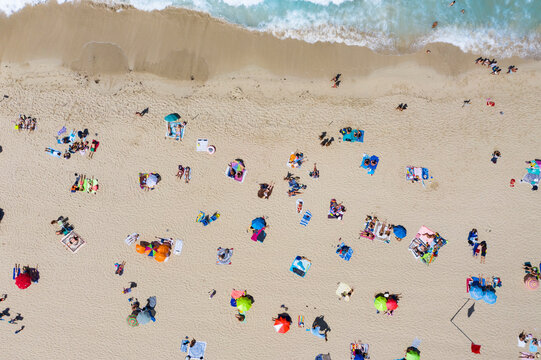 Spain, Majorca, Aerial view of people relaxing on Cala Agulla beach