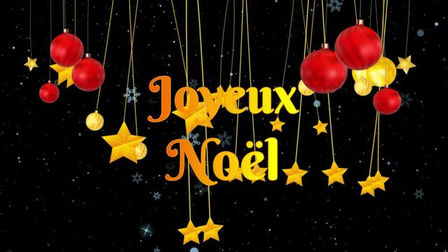 Feliz navidad en idioma franc&eacute;s con nieve, bolas de adorno y estrellas