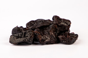 
Prunes on a white background
